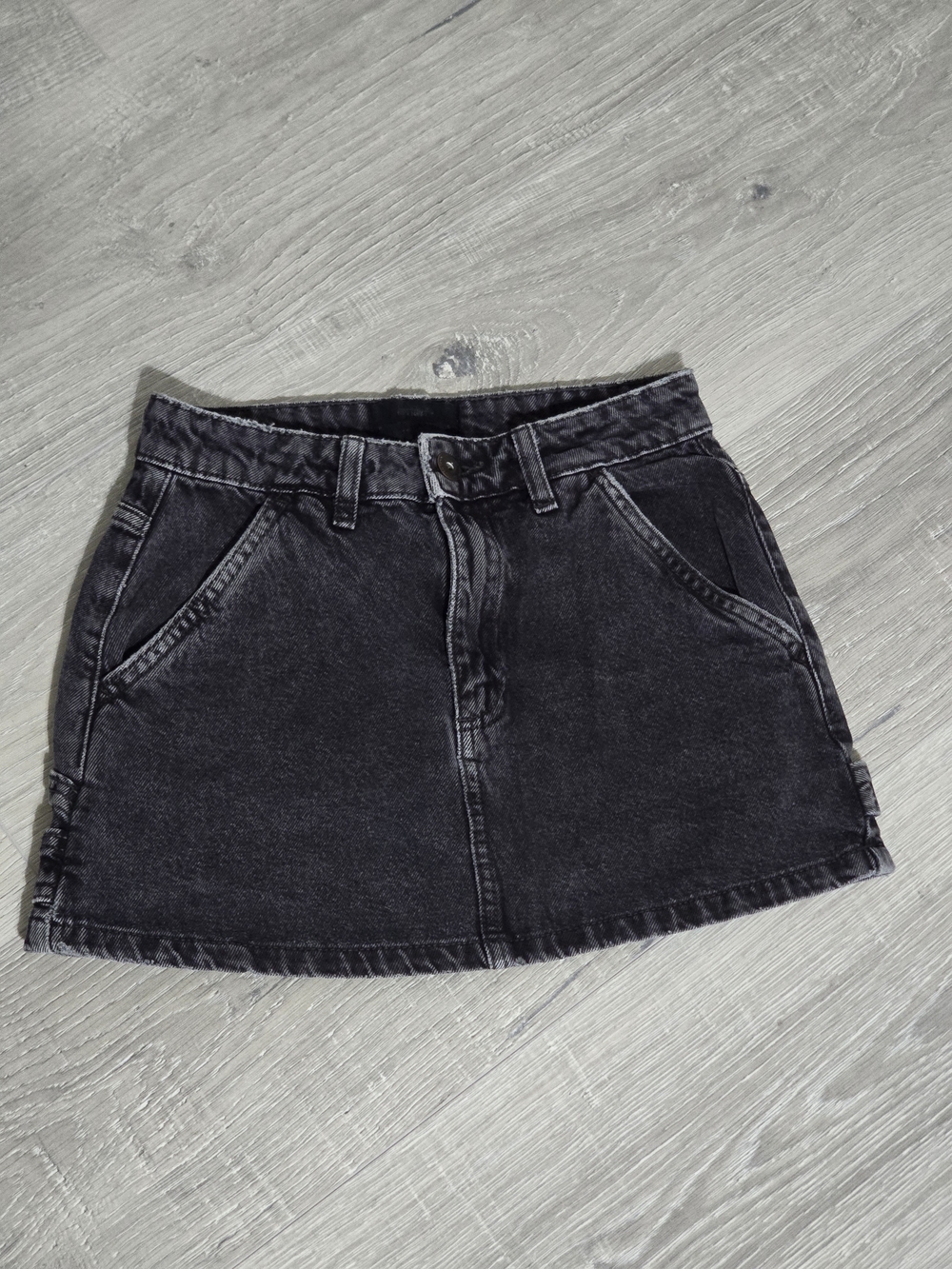 Washed Black Denim Mini Skirt with Front Pockets